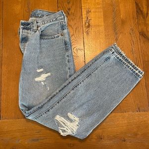 Levi’s 501 jeans. Light wash, destroyed